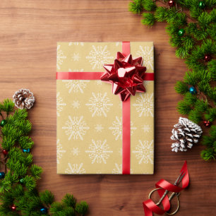 Joli emballage cadeau de Noël jaune doré