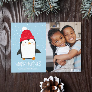 Jolie carte de vœux photo avec un pingouin chaleur