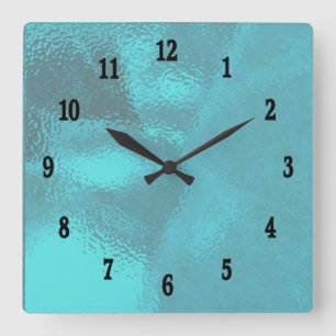 Jolie horloge murale design de verre bleu