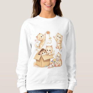Jouer des chatons dans un Sweatshirt de boîte
