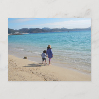 Jouer jour sur la plage Photographie Carte postale