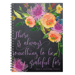 journal de gratitude aux florales sur tableau noir
