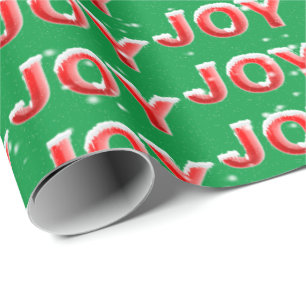 JOY Text mit Schneeflocken auf grünem Hintergrund Geschenkpapier