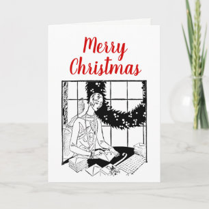 Joyeuse femme de Noël s'adressant aux cartes