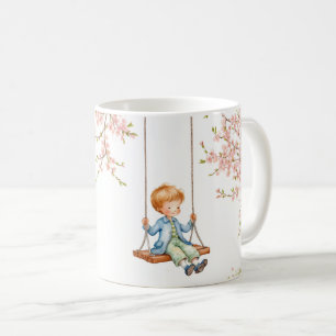 Junge auf einer Schaukel Kirschblüten Kaffeetasse