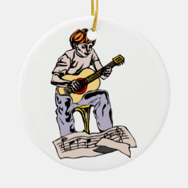 Junge, der Akustikgitarre mit Noten spielt Keramikornament