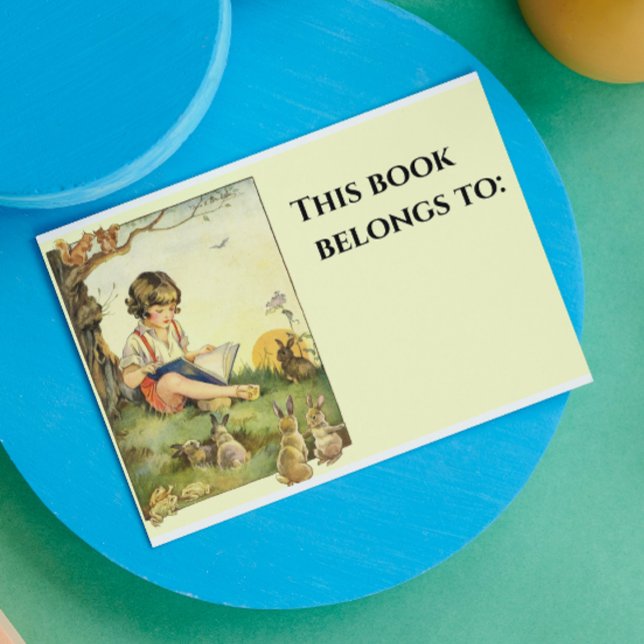 Junge las unter Baum mit Kaninchen Rechteckiger Aufkleber (Von Creator hochgeladen)