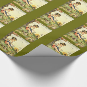 Junge liest unter einem Baum mit Kaninchen Geschenkpapier