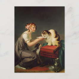 Junge Mädchen, die ihrer Katze Milch geben Postkarte