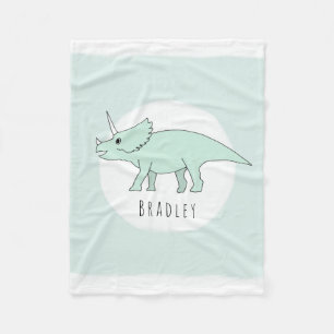 Junge Niedliche grüne Triceratops Dinosaur und Na Fleecedecke