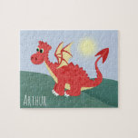 Jungen Niedlich und magisch, rot - walisischer Dra<br><div class="desc">Dieses niedliche und moderne Puzzle-Design mit einem walisischen Drachen-Cartoon,  blauem Himmel und hügeligem Hintergrund kann mit Ihrem Jungennamen personalisiert werden. Das perfekte Geschenk zum Thema Wales für jedes Kind.</div>