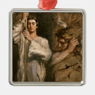 Junger Mann, der ein Kreuz hält Silbernes Ornament