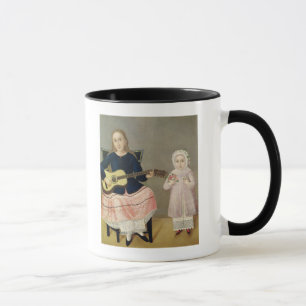 Junges Mädchen mit einer Gitarre und einem Kind Tasse