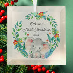 Jungle Elephant Baby's First Christmas Ornament Aus Glas<br><div class="desc">Niedliches Baby's erste Weihnachtsschmuck,  der süßeste kleine Elefant gerahmt mit Aquarelldschungle Blätter.</div>