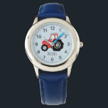 Jungs Niedliche Traktorkinder mit Namen Kinder Armbanduhr<br><div class="desc">Diese niedliche Kinderuhr ist mit handgezeichnet rotem Traktor-Cartoon auf blau mit klaren Zahlen versehen und kann mit dem Namen Ihres Jungen personalisiert werden. Ideal für eine Farm und Traktor liebende Kinder erste Uhr! Karo in unserem Shop für andere niedliche Designs.</div>