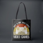Just A Girl Who Loves Video Games Tasche<br><div class="desc">Just A Girl Who Loves Video Games. This funny gamer accessory is a great gift for a woman, girl, teens & kids who love playing video games & computer games. If you're a geek and love console games & computer gaming, this design is for you! Includes a graphic of a...</div>