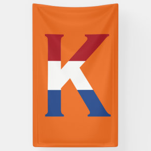 K Monogram überlagert sich auf der NLD-Flagge auf Banner