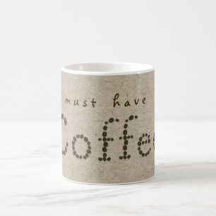 KAFFEE-Bohnen-Typografie natürliche Kraftpapier-Mu Kaffeetasse