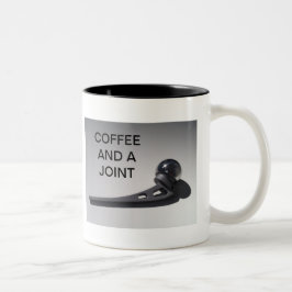 KAFFEE UND EIN GELENK ZWEIFARBIGE TASSE