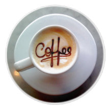 Kaffeetasse und Kaffeemaschine