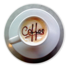 Kaffeetasse und Kaffeemaschine Keramikknauf