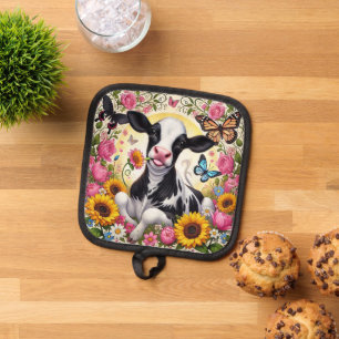 Kalb in einem pulsierenden Flora- und Schmetterlin Topflappen
