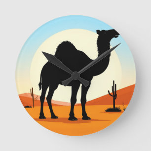 Kamel-Silhouette in der Wüsten-Sonnenuntergangslan Runde Wanduhr