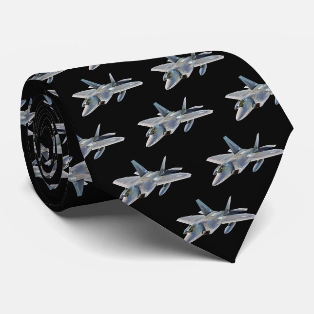 Kampfflugzeug des Raubvogel-F-22 auf Schwarzem Krawatte (Gerollt)