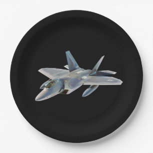 Kampfflugzeug des Raubvogel-F-22 auf Schwarzem Pappteller
