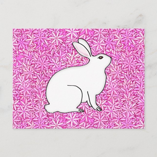 Kaninchen auf einem Bett mit Frühlingsblumen Postkarte (Vorderseite)