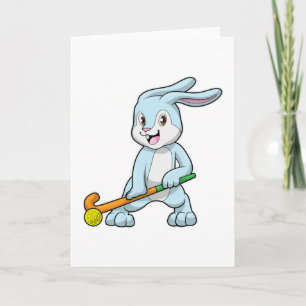 Kaninchen beim Feldhockey mit Hockeyschläger Karte