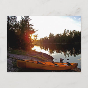 Kanu bei Sonnenuntergang Postkarte
