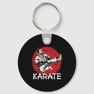 Karate Grunge Design Man macht Jump Kick für Karat Schlüsselanhänger
