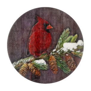 Kardinal und Schnee Pinecones Schneidebrett