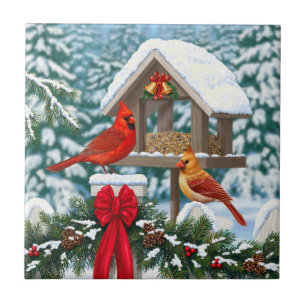 Kardinäle und Weihnachtsvogelfutterstelle Fliese