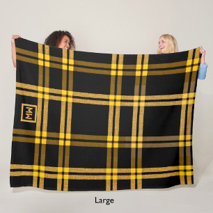 Kariertes Tartan-Monogramm aus Schwarz und Gold Fleecedecke
