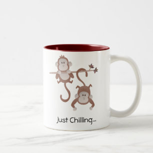 Karikatur-Affen hängen herum Zweifarbige Tasse