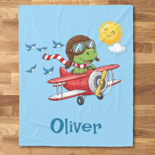 Karikatur-Dinosaurier-Pilot fliegt rotes Flugzeug Fleecedecke