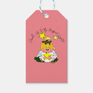 Karikatur-Weihnachtsengel hält Stern Geschenkanhänger