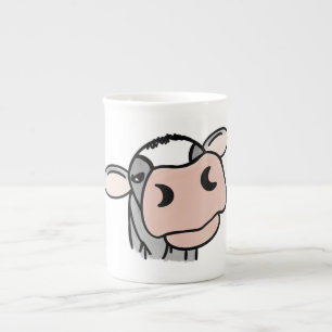 Karikaturkuh schwarz weiß rosa Kuss grau Farmtier Prozellantasse