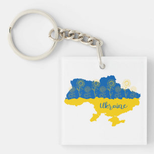 Karte der Ukraine mit Sonnenblumen und ukrainische Schlüsselanhänger