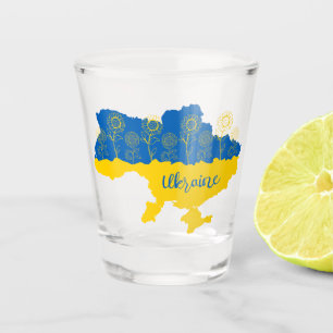 Karte der Ukraine mit Sonnenblumen und ukrainische Schnapsglas