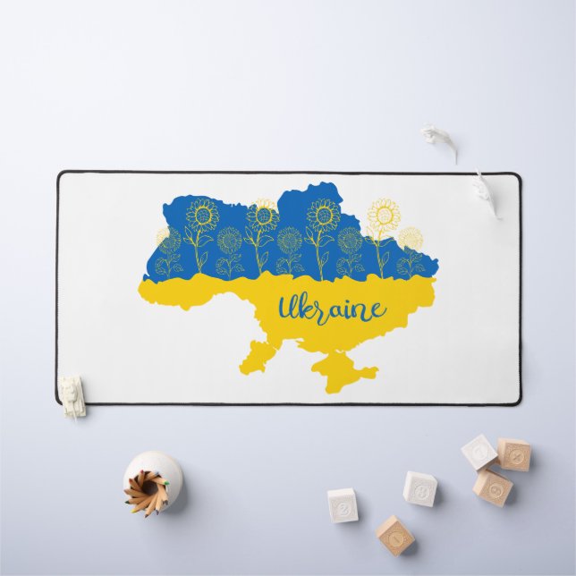 Karte der Ukraine mit Sonnenblumen und ukrainische Schreibtischunterlage (Kindertisch)