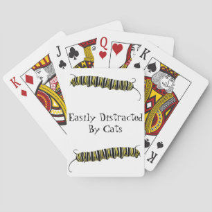 Kartenspielen durch Katze leicht abgelenkt (Säulen Spielkarten