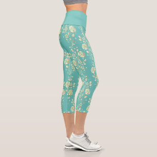 Kaskadierende Gold-Blume auf aquamarin Capri Leggings