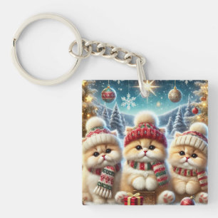Kätzchen in festlicher Weihnachtsdekoration und Sc Schlüsselanhänger