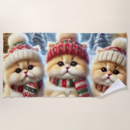 Kätzchen in festlicher Weihnachtsdekoration und Sc Strandtuch