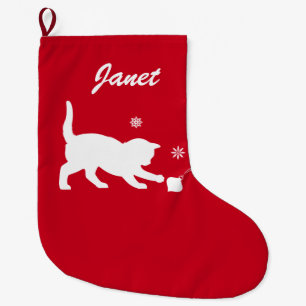 Katze, die mit der Weihnachtsverzierung Großer Weihnachtsstrumpf
