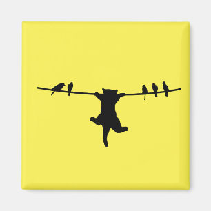 Katze hängt von der Powerschnur ab Magnet