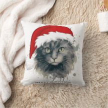 Katze in einer Weihnachtsmannmütze frohe Weihnacht